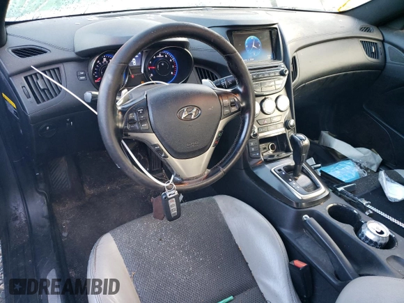 2014 Hyundai Genesis Coupe 2.0T z VIN KMHHT6KD6EU119079, wystawiony jako Copart lot #83364634 z przebiegiem 85 647 mil mil oraz Szkoda całkowita • Salvage title. Historia ofert i sprzedaży dostępna na DreamBid. Obrazek 8.