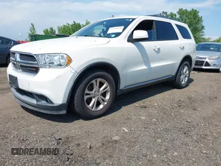 2012 Dodge Durango SXT z VIN 1C4RDJAG0CC294998, wystawiony jako IAAI lot #42230396 z przebiegiem 62 963 mil mil oraz . Historia ofert i sprzedaży dostępna na DreamBid. Obrazek 19.