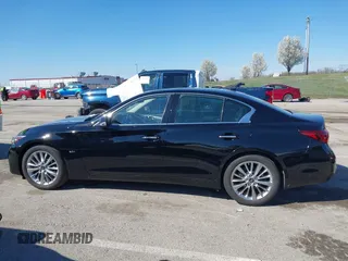 2020 Infiniti Q50 Premium with VIN JN1EV7AR3LM254279, listed as a IAAI auction lot 41877606 with 55,454 mi miles and . Bid and sale history available at DreamBid. Image 14.
