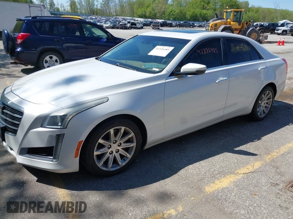 2015 Cadillac CTS Luxury AWD with VIN 1G6AX5SX5F0103725, listed as a IAAI auction lot 42226485 with 112,437 mi miles and . Bid and sale history available at DreamBid. Image 2.