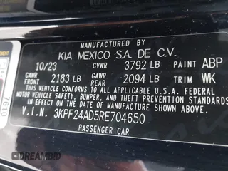 2024 Kia Forte LXS z VIN 3KPF24AD5RE704650, wystawiony jako IAAI lot #42288244 z przebiegiem 26 077 mil mil oraz . Historia ofert i sprzedaży dostępna na DreamBid. Obrazek 9.