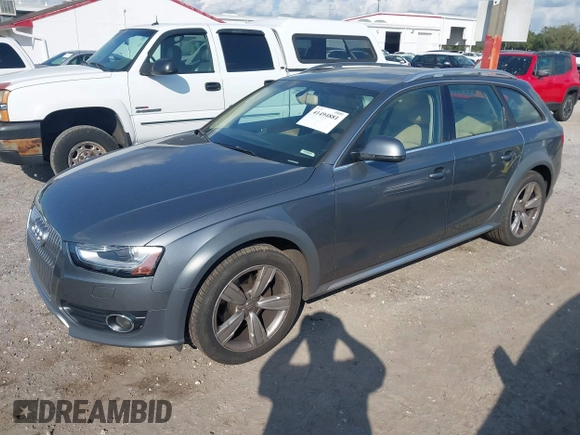 2014 Audi allroad A4 Premium Plus z VIN WA1UFAFL7EA006011, wystawiony jako IAAI lot #41494881 z przebiegiem 70 461 mil mil oraz . Historia ofert i sprzedaży dostępna na DreamBid. Obrazek 19.