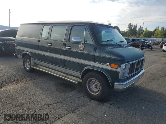 1991 GMC Vandura z VIN 1GDEG25K6M7504729, wystawiony jako Copart lot #71146614 z przebiegiem 181 800 mil mil oraz Tytuł czysty. Historia ofert i sprzedaży dostępna na DreamBid. Obrazek 4.
