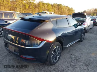 2023 Kia EV6 Wind with VIN KNDC34LA6P5603239, listed as a IAAI auction lot 41071419 with 8,042 mi miles. Bid and sale history available at carsss.com. Image 4.