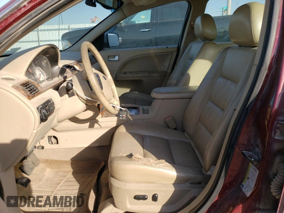 2005 Ford Five Hundred Limited with VIN 1FAFP28105G189607, listed as a Copart auction lot 76132644 with 164,154 mi miles and Clean Title. Bid and sale history available at carsss.com. Image 7.
