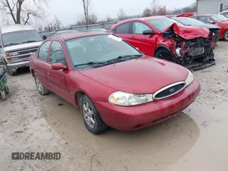 1998 Ford Contour SE z VIN 1FAFP6632WK218003, wystawiony jako IAAI lot #41056783 z przebiegiem 166 023 mil mil oraz . Historia ofert i sprzedaży dostępna na DreamBid. Obrazek 1.
