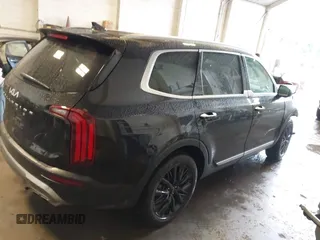 2022 Kia Telluride SX z VIN 5XYP54HC5NG264239, wystawiony jako IAAI lot #42259083 z przebiegiem 82 324 mil mil oraz . Historia ofert i sprzedaży dostępna na DreamBid. Obrazek 4.