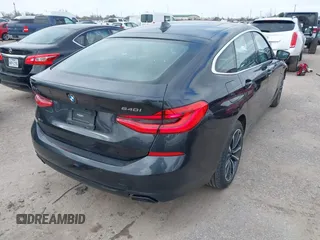 2019 BMW 6 Series 640i xDrive with VIN WBAJV6C50KBK08934, listed as a IAAI auction lot 41588796 with 61,411 mi miles and . Bid and sale history available at carsss.com. Image 4.