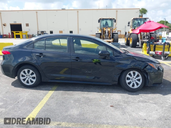2023 Toyota Corolla LE with VIN JTDB4MEE2PJ004869, listed as a IAAI auction lot 42139964 with 41,119 mi miles. Bid and sale history available at carsss.com. Image 6.
