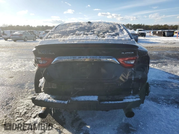 2016 Nissan Maxima SL with VIN 1N4AA6APXGC390099, listed as a Copart auction lot 41359135 with 66,199 mi miles and Salvage Title. Bid and sale history available at DreamBid. Image 6.