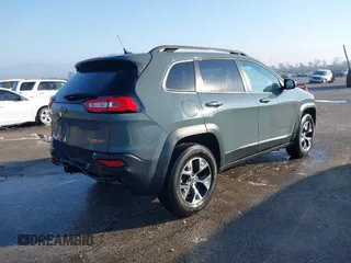 2014 Jeep Cherokee Trailhawk z VIN 1C4PJMBS2EW212341, wystawiony jako IAAI lot #40672694 z przebiegiem 108 622 mil mil oraz . Historia ofert i sprzedaży dostępna na DreamBid. Obrazek 4.