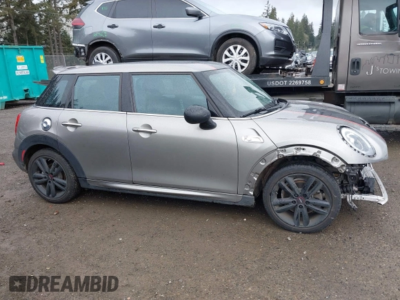 2017 MINI Hardtop 4 Door Cooper S z VIN WMWXU3C58H2D33073, wystawiony jako IAAI lot #41913081 z przebiegiem 51 631 mil mil oraz . Historia ofert i sprzedaży dostępna na DreamBid. Obrazek 14.