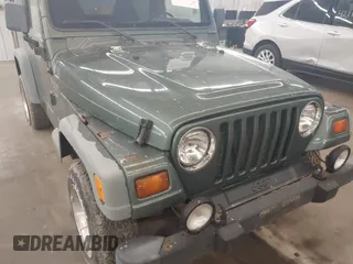 1999 Jeep Wrangler Sport with VIN 1J4FY19S0XP496555, listed as a IAAI auction lot 42110414 with 125,500 mi miles. Bid and sale history available at carsss.com. Image 6.