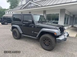 2007 Jeep Wrangler Rubicon z VIN 1J4GA64127L170574, wystawiony jako IAAI lot #42474509 z przebiegiem 142 976 mil mil oraz . Historia ofert i sprzedaży dostępna na DreamBid. Obrazek 1.