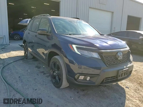 2019 Honda Passport Elite z VIN 5FNYF8H05KB012427, wystawiony jako Copart lot #50409635 z przebiegiem 72 814 mil mil oraz Szkoda całkowita • Salvage title. Historia ofert i sprzedaży dostępna na DreamBid. Obrazek 14.