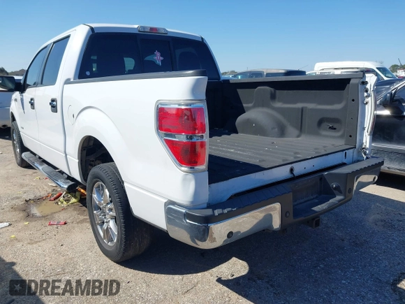 2014 Ford F-150 XL with VIN 1FTFW1CT0EKF35393, listed as a IAAI auction lot 41616886 with 138,535 mi miles. Bid and sale history available at carsss.com. Image 3.