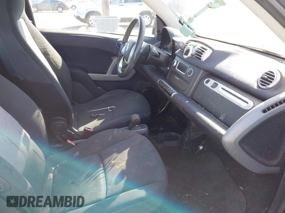 2013 Smart fortwo Pure с VIN WMEEJ3BA1DK647416, выставлен на аукционе IAAI как лот 41676693 с пробегом 102 772 миль миль и . История ставок и продаж доступна на DreamBid. Изображение 5.