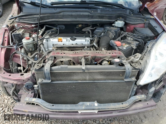 2011 Honda CR-V SE z VIN JHLRE4H46BC024315, wystawiony jako Copart lot #55491055 z przebiegiem 145 577 mil mil oraz Szkoda całkowita • Salvage title. Historia ofert i sprzedaży dostępna na DreamBid. Obrazek 12.