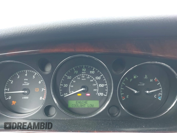 2006 Jaguar XJ with VIN SAJWA71B96SH04571, listed as a IAAI auction lot 41574323 with 1 mi miles. Bid and sale history available at carsss.com. Image 14.
