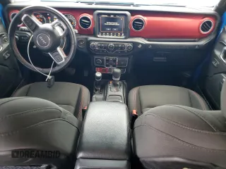 2021 Jeep Wrangler Unlimited Rubicon with VIN 1C4JJXFM7MW794325, listed as a Copart auction lot 54525315 with 43,826 mi miles and Salvage title. Bid and sale history available at DreamBid. Image 8.