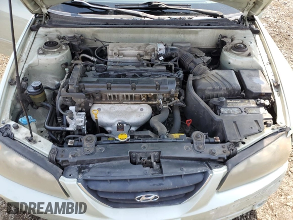 2004 Hyundai Elantra GLS z VIN KMHDN46D14U861749, wystawiony jako Copart lot #52625215 z przebiegiem 130 063 mil mil oraz Szkoda całkowita • Salvage title. Historia ofert i sprzedaży dostępna na DreamBid. Obrazek 11.
