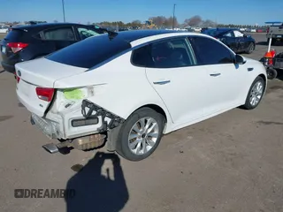 2016 Kia Optima EX with VIN 5XXGU4L32GG032974, listed as a IAAI auction lot 41881338 with 118,590 mi miles. Bid and sale history available at carsss.com. Image 4.