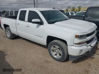 2018 Chevrolet Silverado 1500 LT with VIN 1GCVKREC0JZ315238, listed as a IAAI auction lot 41856052 with 163,131 mi miles. Bid and sale history available at carsss.com. Image 1.