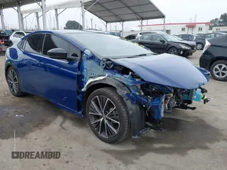 2023 Toyota Prius LE z VIN JTDACAAU8P3002445, wystawiony jako IAAI lot #42159749 z przebiegiem 18 510 mil mil oraz . Historia ofert i sprzedaży dostępna na DreamBid. Obrazek 1.