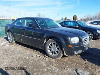 2009 Chrysler 300 Touring with VIN 2C3KA53V79H617936, listed as a IAAI auction lot 41670622 with 154,778 mi miles. Bid and sale history available at carsss.com. Image 1.