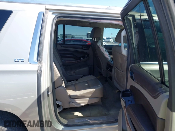 2016 Chevrolet Suburban LTZ with VIN 1GNSKJKC6GR279483, listed as a IAAI auction lot 41973085 with 171,176 mi miles and . Bid and sale history available at DreamBid. Image 8.