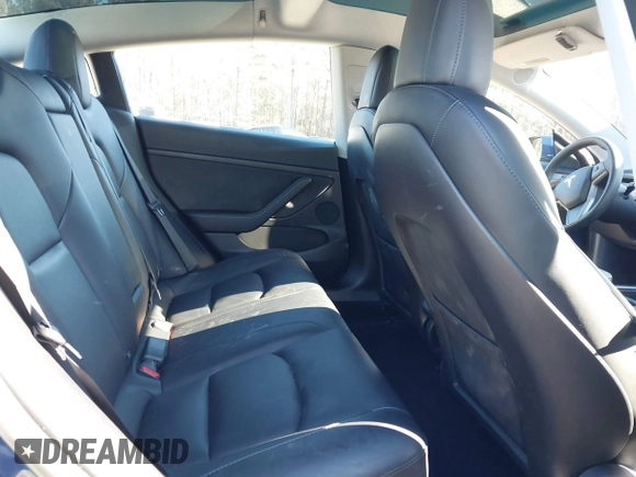 2022 Tesla Model 3 Long Range with VIN 5YJ3E1EB1NF257059, listed as a IAAI auction lot 41329318 with 30,652 mi miles and . Bid and sale history available at DreamBid. Image 8.