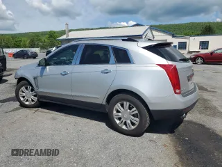 2014 Cadillac SRX Luxury Collection z VIN 3GYFNEE37ES630832, wystawiony jako Copart lot #56335035 z przebiegiem 102 076 mil mil oraz Szkody całkowita. Historia ofert i sprzedaży dostępna na DreamBid. Obrazek 2.