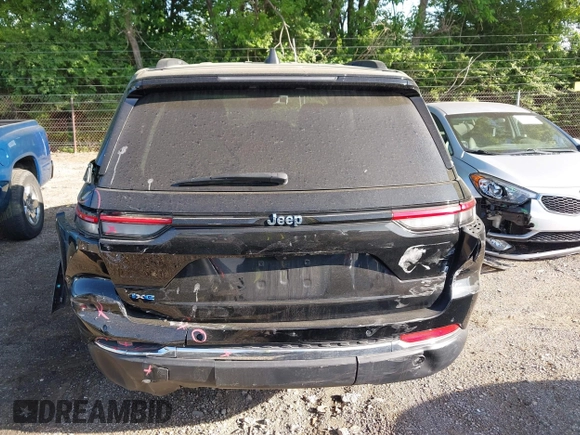 2023 Jeep Grand Cherokee with VIN 1C4RJYB68PC648859, listed as a IAAI auction lot 42267180 with 29,809 mi miles and . Bid and sale history available at DreamBid. Image 16.