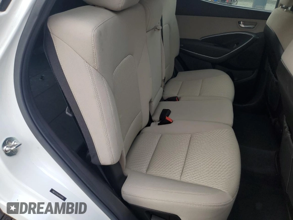 2018 Hyundai Santa Fe 2.4L z VIN 5NMZU3LB6JH104469, wystawiony jako Copart lot #57587495 z przebiegiem 78 267 mil mil oraz Szkoda całkowita • Salvage title. Historia ofert i sprzedaży dostępna na DreamBid. Obrazek 10.