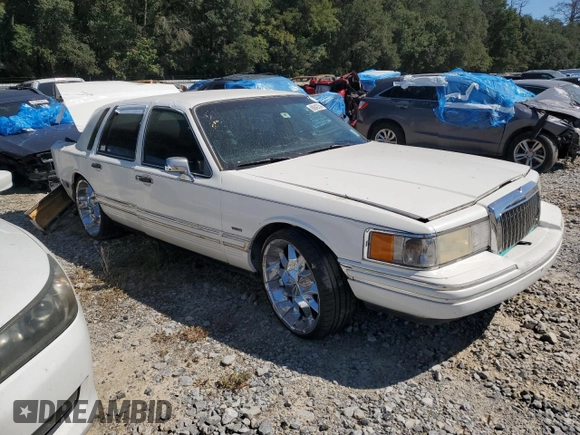 1994 Lincoln Town Car Signature z VIN 1LNLM82W7RY781174, wystawiony jako Copart lot #69642754 z przebiegiem 149 185 mil mil oraz Szkoda całkowita • Salvage title. Historia ofert i sprzedaży dostępna na DreamBid. Obrazek 4.