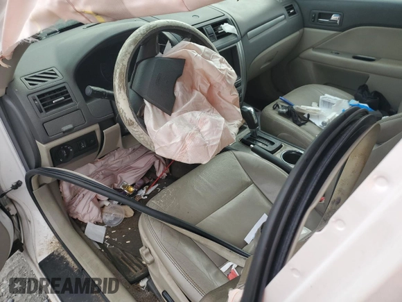 2010 Ford Fusion Hybrid with VIN 3FADP0L30AR381035, listed as a Copart auction lot 59711955 with Not provided miles and Salvage title. Bid and sale history available at DreamBid. Image 8.
