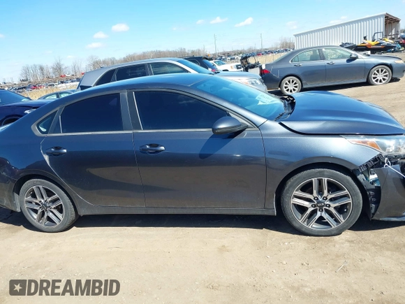 2019 Kia Forte S z VIN 3KPF34AD0KE020141, wystawiony jako IAAI lot #41857548 z przebiegiem 111 021 mil mil oraz . Historia ofert i sprzedaży dostępna na DreamBid. Obrazek 13.