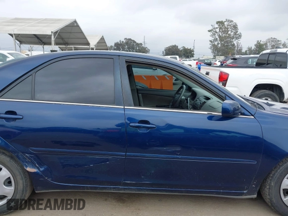 2005 Toyota Camry STD z VIN 4T1BE32K55U084967, wystawiony jako IAAI lot #42138311 z przebiegiem 272 779 mil mil oraz . Historia ofert i sprzedaży dostępna na DreamBid. Obrazek 13.