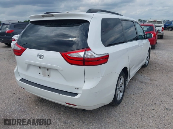 2016 Toyota Sienna LE AAS with VIN 5TDKK3DCXGS709132, listed as a IAAI auction lot 41993473 with 270,811 mi miles. Bid and sale history available at carsss.com. Image 4.