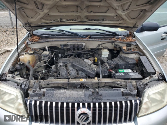 2005 Mercury Mariner Luxury z VIN 4M2CU56185DJ12005, wystawiony jako Copart lot #73570914 z przebiegiem 185 354 mil mil oraz Tytuł czysty. Historia ofert i sprzedaży dostępna na DreamBid. Obrazek 12.