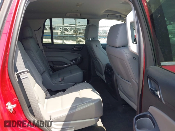 2015 Chevrolet Tahoe LT with VIN 1GNSKBKC6FR628355, listed as a IAAI auction lot 42159743 with 95,730 mi miles and . Bid and sale history available at DreamBid. Image 8.