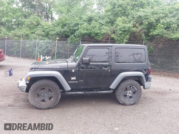 2007 Jeep Wrangler Rubicon with VIN 1J4GA64117L149666, listed as a IAAI auction lot 42252464 with 100,791 mi miles and . Bid and sale history available at DreamBid. Image 14.