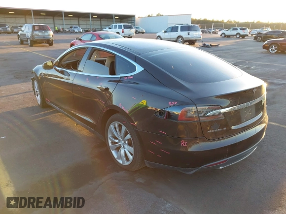 2013 Tesla Model S with VIN 5YJSA1CN7DFP22690, listed as a IAAI auction lot 40981089 with 188,057 mi miles. Bid and sale history available at carsss.com. Image 3.