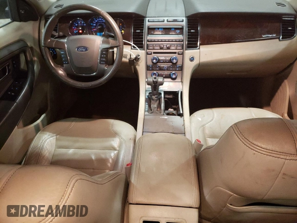 2012 Ford Taurus SEL with VIN 1FAHP2EW2CG143718, listed as a Copart auction lot 55443865 with 212,996 mi miles and Clean Title. Bid and sale history available at DreamBid. Image 8.