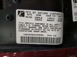 2002 Saturn SL with VIN 1G8ZH52822Z228302, listed as a Copart auction lot 58043985 with 153,058 mi miles and Salvage title. Bid and sale history available at DreamBid. Image 12.
