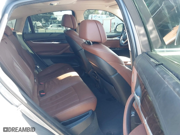 2015 BMW X6 xDrive50i with VIN 5UXKU6C52F0F94060, listed as a IAAI auction lot 41299202 with 67,835 mi miles. Bid and sale history available at carsss.com. Image 8.