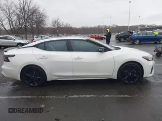 2020 Nissan Maxima SR with VIN 1N4AA6EV1LC373694, listed as a IAAI auction lot 41732550 with 80,453 mi miles and . Bid and sale history available at carsss.com. Image 13.