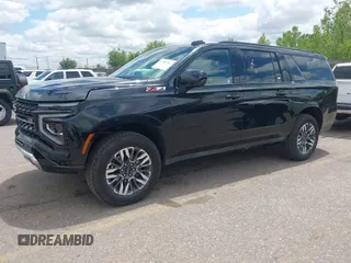 2025 Chevrolet Suburban Z71 z VIN 1GNS6DRD3SR228259, wystawiony jako IAAI lot #42381761 z przebiegiem 3 891 mil mil oraz . Historia ofert i sprzedaży dostępna na DreamBid. Obrazek 17.