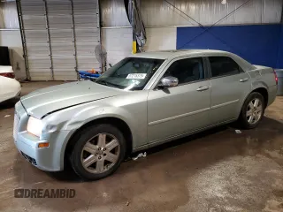 2006 Chrysler 300 Touring z VIN 2C3LK53GX6H134827, wystawiony jako Copart lot #57215375 z przebiegiem 240 594 mil mil oraz Szkoda całkowita • Salvage title. Historia ofert i sprzedaży dostępna na DreamBid. Obrazek 1.
