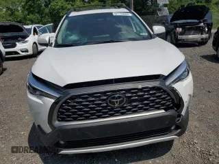 2023 Toyota Corolla Cross XLE with VIN 7MUDAABGXPV060797, listed as a Copart auction lot 62110665 with 18,293 mi miles and Salvage title. Bid and sale history available at DreamBid. Image 5.